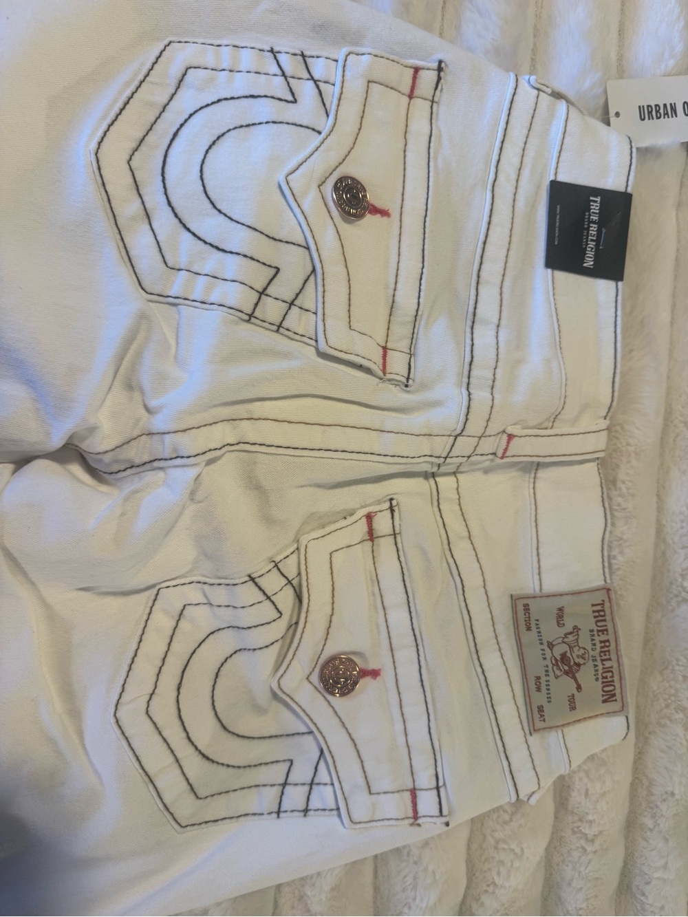 True Religion Women’s White Jeans with hot pink & black stitching. Becca size 26